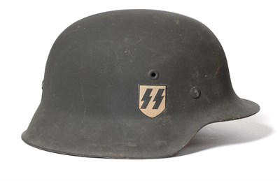 Lot 309 - A German Third Reich Waffen-SS M42 Helmet, retaining most of the original matt grey paint, with...