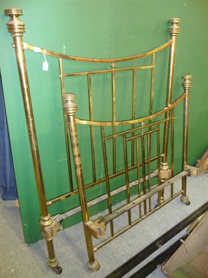 Lot 575 - A Victorian Brass Single Bedstead, each conforming end with ring turned finials, the convex...