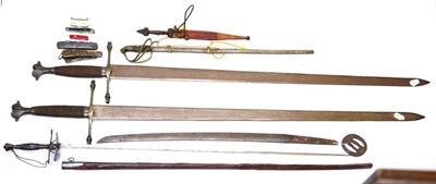 Lot 339 - A Collection of Edged Weapons, including a Japanese wakizashi blade and iron tsuba (af), two...