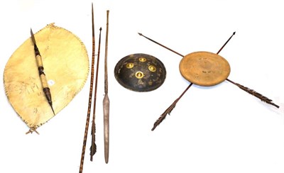 Lot 384 - A 19th Century Zulu Assegai, with hide bound wood haft and swollen butt; an African Hide Shield and