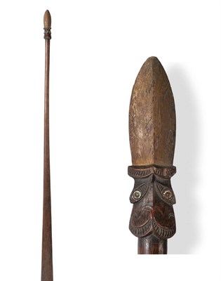 Lot 388 - A 19th Century New Zealand Maori Taiaha, the Janus head with carved eyebrows and slanting eyes...