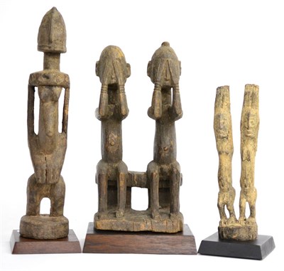 Lot 393 - A Dogon (Mali), Tellem Style Carved Wood Group, primitively modelled as a pair of figures,...