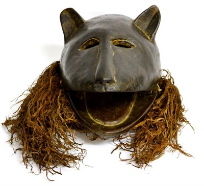 Lot 402 - An African Carved Wood Animal Mask, possibly Hemba (Congo), of large cat form, with articulated...