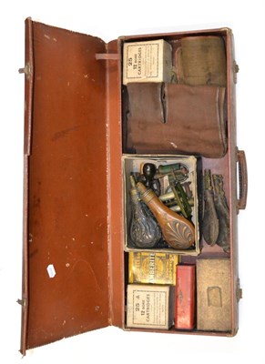 Lot 409 - A Quantity of Gun Accessories, including two leather shot flasks, two copper powder flasks,...