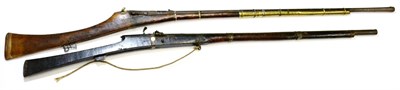 Lot 469 - A 19th Century Indian Matchlock Long Gun, the 114.5cm four stage steel barrel with deep fluting...