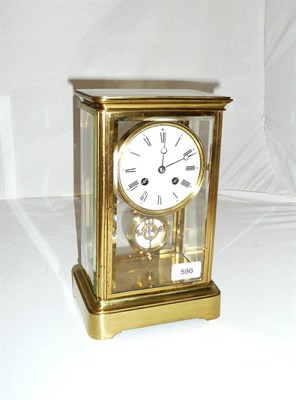 Lot 590 - A Gilt Brass Four Glass Striking Mantel Clock, circa 1900, case with four bevelled glass...