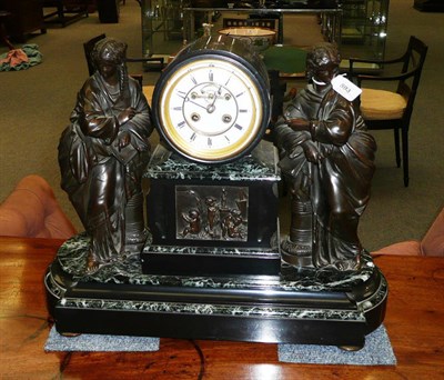 Lot 593 - A Victorian Black Slate Figural Mantel Clock, circa 1870, the drum encased movement with white...