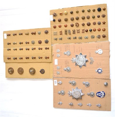 Lot 125 - A Collection of Eighty Three Military Badges and Buttons, including collar badges, helmet plate...