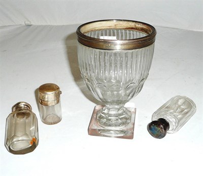 Lot 605 - A 19th Century Cut Glass Vase, with silver rim; and Three Silver Topped Toilet Bottles (4)