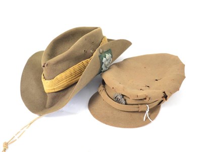 Lot 213 - A Second World War Slouch Hat to the Highland Light Infantry, with seven fold puggaree and...