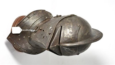 Lot 222 - A Victorian Copy of a 16th Century Close Helmet, the skull with raised comb and folded seam, hinged