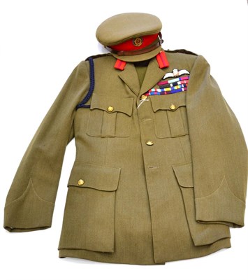 Lot 234 - A Second World War Period No.2 Dress Uniform, later badged to represent King George VI as...