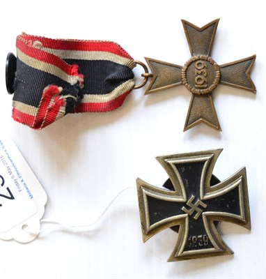 Lot 236 - A German Third Reich Iron Cross, First Class, non-magnetic, with screw back, maker's mark L/12;...