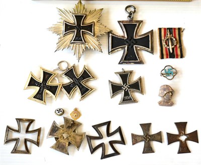 Lot 245 - Two 1957 Versions of the 1939 Iron Cross, first and second class; a Dismantled 1939 Iron Cross,...