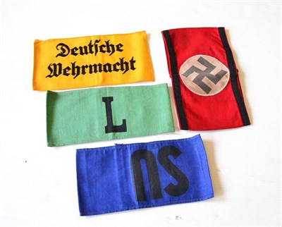 Lot 251 - A Copy of a German Third Reich SS Armband, in red cotton applied with a white cotton roundel...