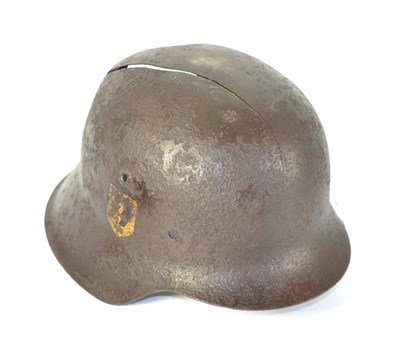 Lot 255 - A German Third Reich M40 Helmet, with remnants of SS runes decal, in relic condition