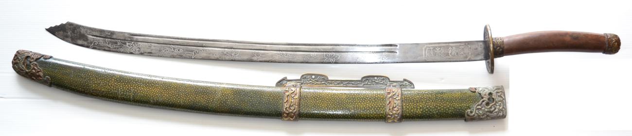 Lot 281 - A 19th Century Chinese Sword, the 72.5cm wavy hatchet tip single edge steel blade with two...