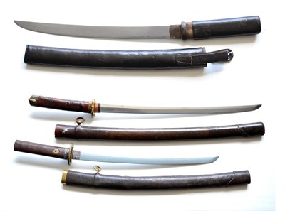 Lot 287 - A Japanese Wakizashi, the 54cm steel blade with faint undulating hamon and delamination marks,...