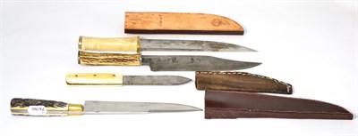 Lot 329 - A Russell Green River Knife, with single edge scallop back steel blade and bone grip with...