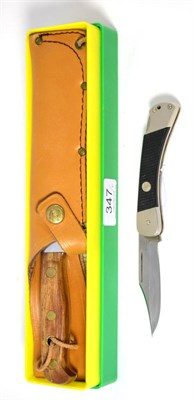 Lot 347 - A Puma Auto 6390 Knife, numbered 41582, with leather sheath and in original plastic box with...