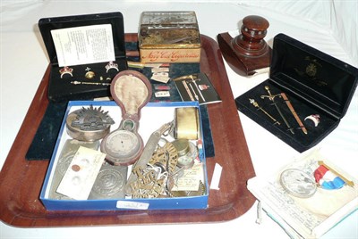 Lot 627 - A Quantity of Militaria, including two German Army belt clasps, a cased pocket barometer, cap...