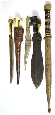 Lot 369 - A 19th Century Indian Pesh Kabz, with 24cm T section steel blade, with bone earred grip and...