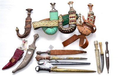 Lot 371 - Four Various Saudi Arabian/Omani Jambiyas, with scabbards, one with gold wire-embroidered belt,...