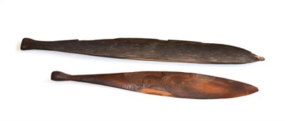 Lot 373 - An Australian Aborigine Woomera (Spear Thrower), of plain curved hardwood, one end with fine...