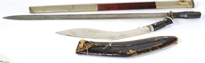 Lot 378 - A Late 19th Century Burmese Type Sword, the 66cm broad single edge steel blade with narrow...