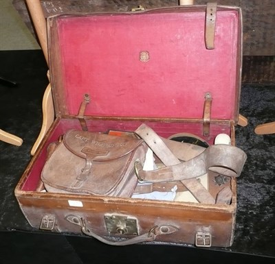 Lot 630 - A Leather Suitcase Belonging to Captain Wilfred Hext, containing a leather cartridge bag, a leather