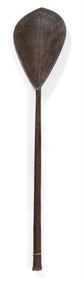 Lot 390 - A 19th Century Austral Islands Paddle, the leaf shape blade and oval section haft intricately...