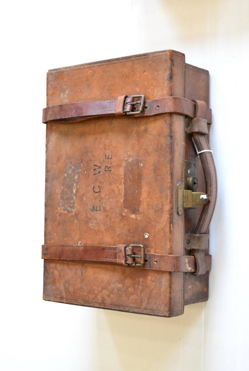 Lot 406 - A Stitched Leather Cartridge Case by Army & Navy C.S.L., the hinged cover embossed E.C.W.,...