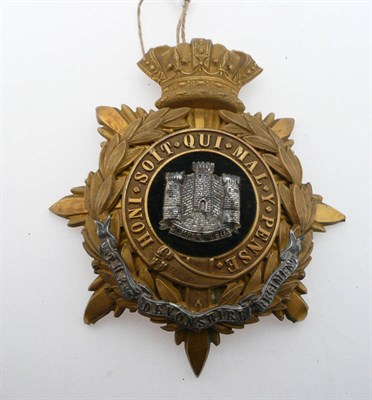 Lot 633 - A Devonshire Regiment Brass Helmet Plate, with silver mounts.