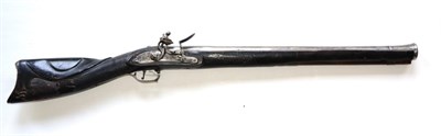 Lot 527 - A 19th Century Turkish Flintlock Carbine, the 56cm swamped steel barrel, hammer and lock plate...