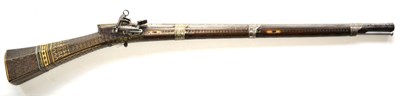 Lot 532 - A 19th Century Afghan Miquelet Carbine, the 74.5cm octagonal steel barrel chiselled and etched with