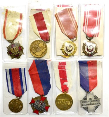 Lot 10 - A Collection of Eleven Polish Medals, comprising:- three Medals of Merit for National Defence,...