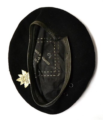 Lot 55 - A Second World War Canadian Special Forces Kangol Beret, dated 1945 and with rare white metal RECCE