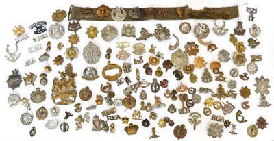 Lot 57 - A Large Quantity of British Military Badges, including cap, collar, glengarry and a helmet...