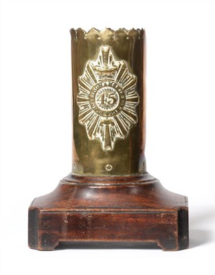 Lot 73 - A Brass Trench Art Vase, with scalloped rim, applied with a helmet plate to the 45th...