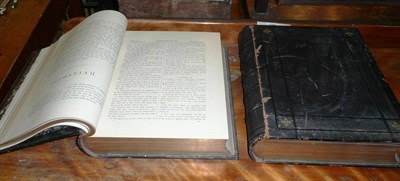 Lot 656 - Two Leather-Bound Bibles, volumes I and II