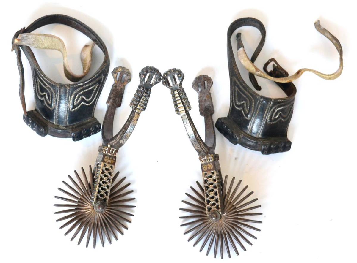 Lot 110 - A Pair of Late 19th Century Spanish 32 Point Rowel Spurs, pierced and damascus with ornamental...