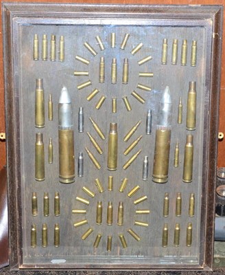 Lot 132 - A Display of Brass Cartridges, and shell cases of varying sizes, mainly Second World War...