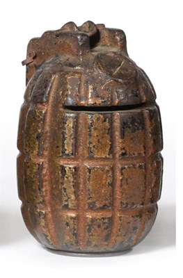 Lot 148 - A First World War Mills Bomb (Hand Grenade), complete with ring pull, later painted gilt and...