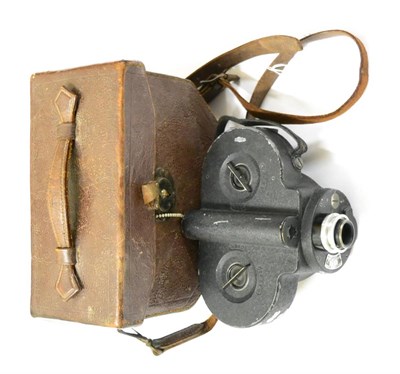 Lot 168 - A Second World War Period Bell & Howell Automatic Cine Camera, with chromed winding key, in...