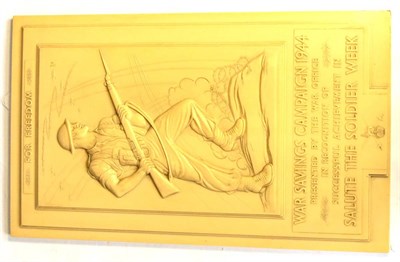 Lot 176 - A Second World War Cream Bakelite War Savings Campaign 1944 Wall Plaque, of vertical...