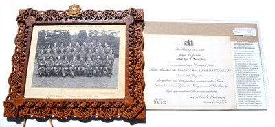 Lot 185 - A Group Photograph of 6th East Riding Battalion, Home Guard, in a fret carved wood frame set...