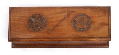 Lot 190 - A Boer War St Helena Prisoner of War Glove Box, in walnut, the hinged cover carved with the arms of