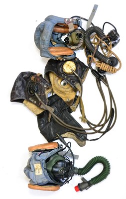 Lot 198 - Two RAF Leather C-Type Flying Helmets, one with bakelite earpieces marked with crown over AM,...