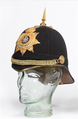 Lot 199 - An Edwardian Officer's 1878 Pattern Home Service Blue Cloth Helmet to the Manchester Regiment, with