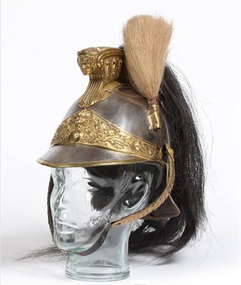 Lot 200 - A Late 19th Century French Cuirassier's Helmet, in white metal with brass bound pointed visor...